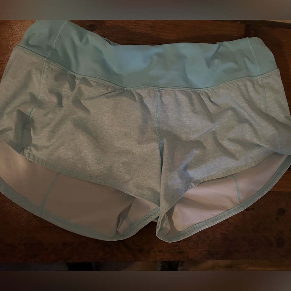 Lululemon speed up shorts in a frosty blue color.
